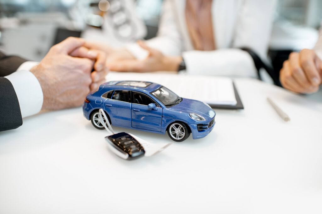 Toy car with keychain on the table